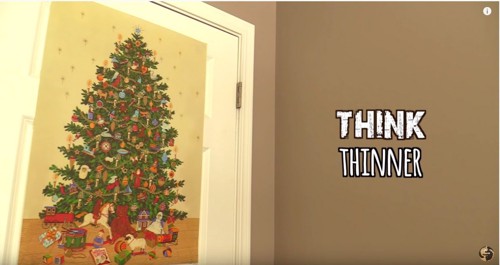 ドアにクリスマスツリーのポスター